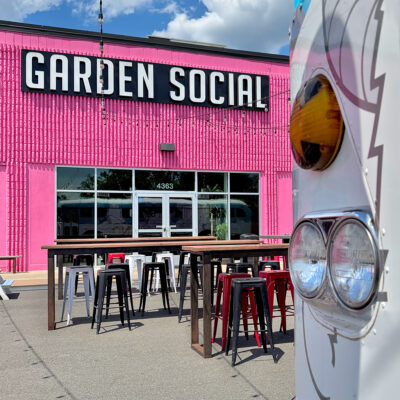 Garden Social outdoor seating near the old bus.