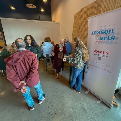 Friends, family, supporters, and Mason District Arts Council members enjoy food and beverages at our May social gathering on May 14, 2026.