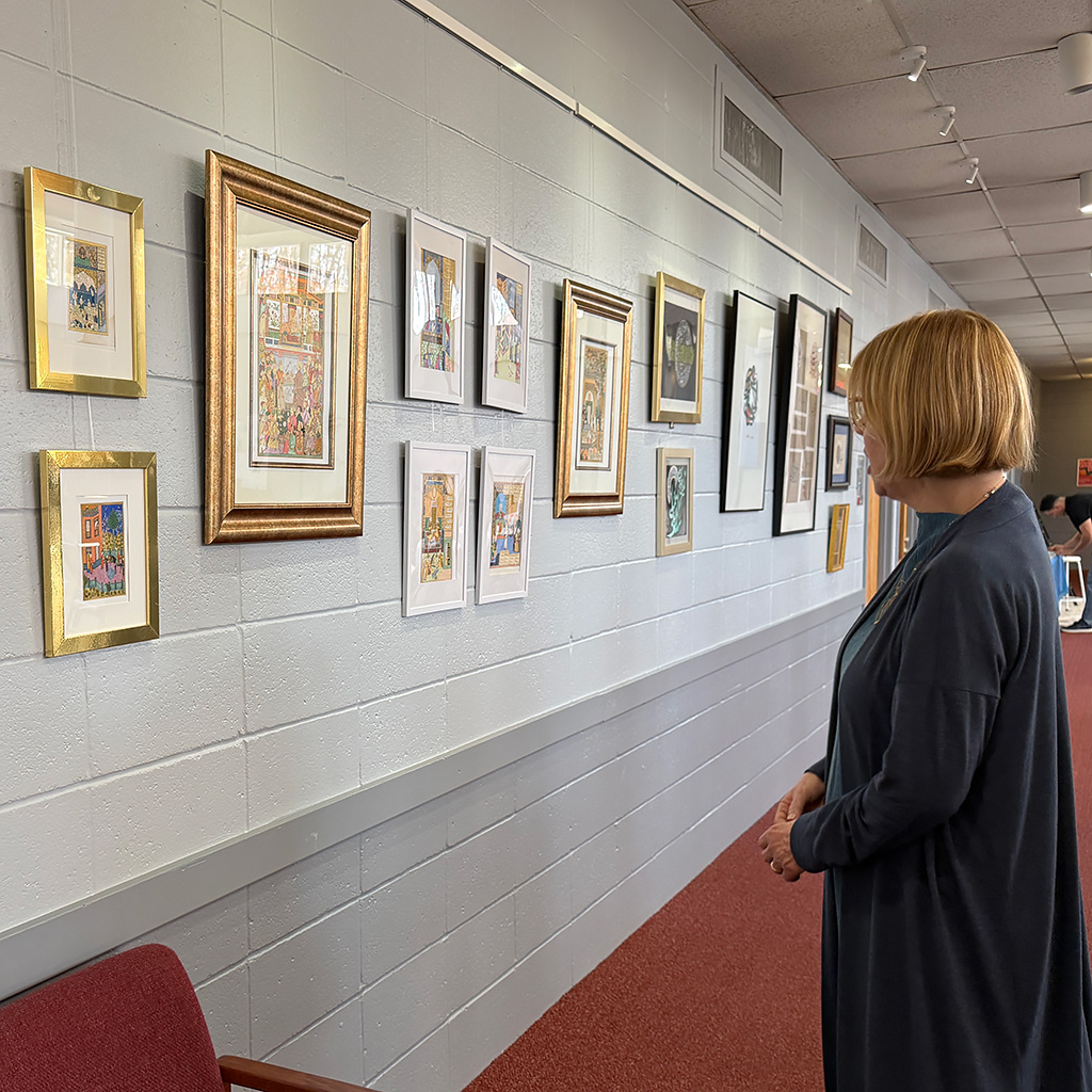 Miniature paintings rescued from Afghanistan were displayed during the Nowruz celebration on March 21, 2026 at John Calvin Presbyterian Church in Annandale, VA.