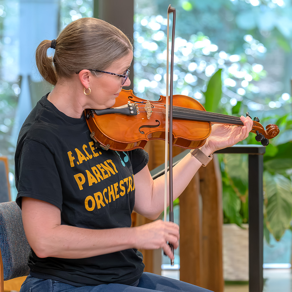 The FACE Parent Orchestra includes more than 250 interested parents of orchestra students in elementary, middle, and high school.