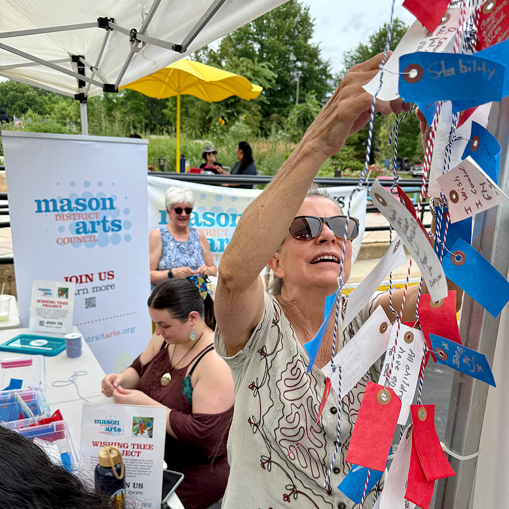 Mason District Arts Council Wishing Tree tags being collected and tied to string as part of the Mason Arts 250 series of activities to commemorate America's 250 founding anniversary.