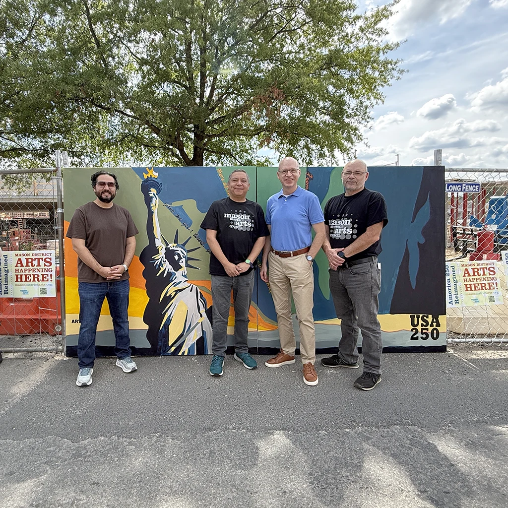 (L-R) Omaid Sharifi, President of ArtLords; Mason District Supervisor Andres Jimenez; Stuart Holt, CEO of ArtsFairfax; and Mason District Arts Council chair James Albright with the Mason Arts 250 community mural.