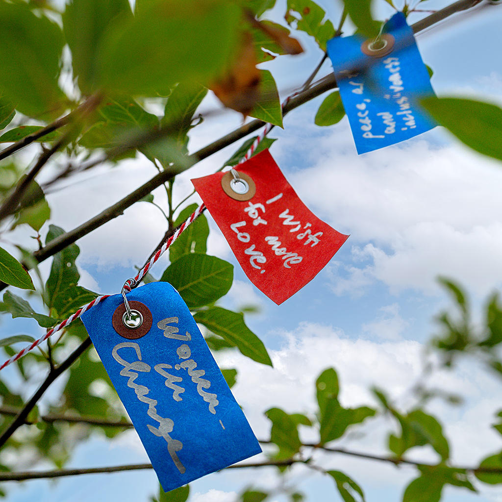Tags on the Mason District Arts Council Wishing Tree.